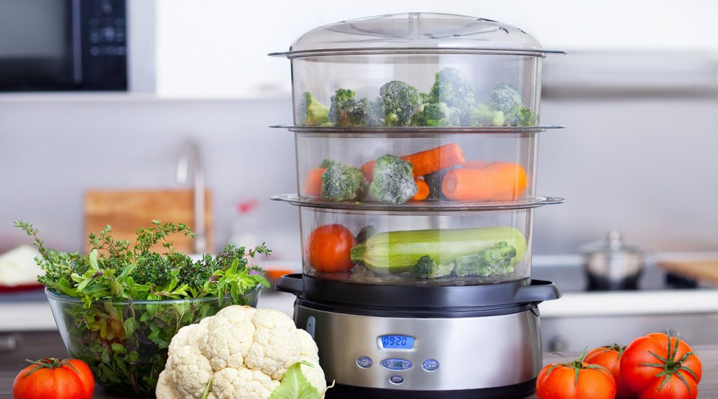 Vaporiera con all'interno divrse versure